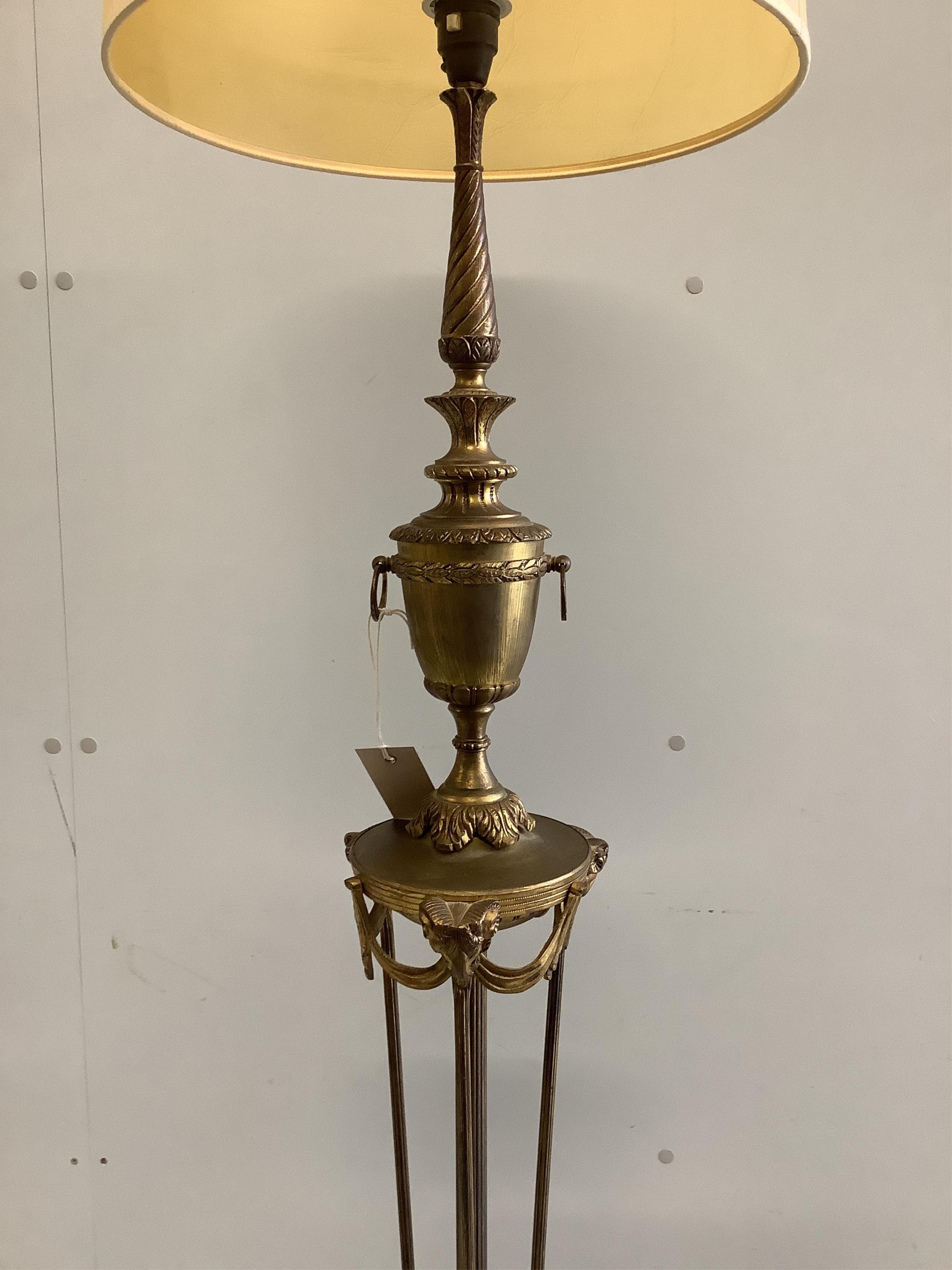 An Empire style gilt metal standard lamp, height including shade 159cm. Condition - fair to good